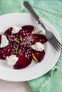 Roasted beet salad with goat cheese and sesame seeds, vegetarian