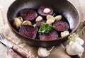 Roasted beetroot over rustic wooden background