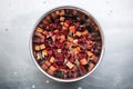 roasted beets cubes in a stainless steel mixing bowl