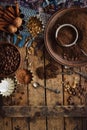 Roasted black and green coffee beans and ground coffee in the plate Royalty Free Stock Photo