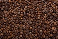 Roasted brown coffee beans, can be used as a background and texture Royalty Free Stock Photo