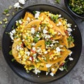 Roasted Butternut Squash or Pumpkin with Sweetcorn Salsa Feta and Pepitas Royalty Free Stock Photo