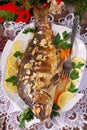 Roasted carp stuffed with vegetables for christmas Royalty Free Stock Photo