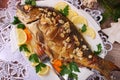 Roasted carp stuffed with vegetables for christmas Royalty Free Stock Photo