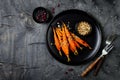 Roasted carrots with dukkah. Vegetarian food.