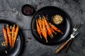 Roasted carrots with dukkah. Vegetarian food. Top view, flat lay.