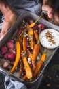 Roasted Carrots, Roasted Radishes with Dukkah Spice and Feta Cheese Sauce Royalty Free Stock Photo