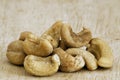 Roasted cashew nuts on an old wooden table.