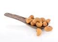 Roasted cashew nuts whith salt on white background. Royalty Free Stock Photo
