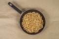 Roasted cashews in frying pan Royalty Free Stock Photo