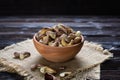 Roasted cashews on natural wooden table background Royalty Free Stock Photo