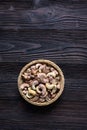 Roasted cashews on natural wooden table background Royalty Free Stock Photo