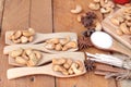 Roasted cashews nuts with natural on wood background