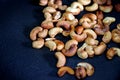 Roasted cashews in the pan. Royalty Free Stock Photo