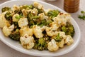 Roasted cauliflower and broccoli on a serving plate, healthy vegetable side dish Royalty Free Stock Photo