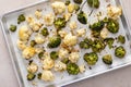 Roasted cauliflower and broccoli on a sheet pan, healthy vegetable side dish Royalty Free Stock Photo