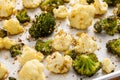 Roasted cauliflower and broccoli on a sheet pan, healthy vegetable side dish Royalty Free Stock Photo