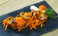 Roasted champignons with julienne carrots