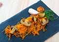 Roasted champignons with julienne carrots