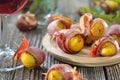 Roasted chestnuts with bacon and wine Royalty Free Stock Photo