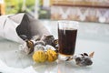 Roasted chestnuts and glass of sweet wine Royalty Free Stock Photo