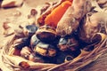 Roasted chestnuts and roasted sweet potatoes in a basket Royalty Free Stock Photo