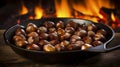 Roasted chestnuts with sugar and spice salt presented in a grill pan. Typical autumn dish. Taste chestnuts roasted