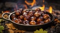 Roasted chestnuts with sugar and spice salt presented in a grill pan. Typical autumn dish. Taste chestnuts roasted