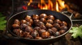 Roasted chestnuts with sugar and spice salt presented in a grill pan. Typical autumn dish. Taste chestnuts roasted