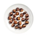 Roasted Chestnuts On White Plate On A White Background