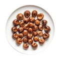 Roasted Chestnuts On White Plate On A White Background