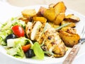 Roasted Chicken Breast with Sweet Potatoes and Salad Garnish Royalty Free Stock Photo