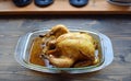 Roasted chicken with a crunching crack on a table Royalty Free Stock Photo