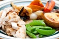 a delicious roasted chicken dinner with fresh vegetables and gra Royalty Free Stock Photo