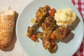 Roasted chicken drumsticks with mashed potatoes carrots and fresh bread Royalty Free Stock Photo