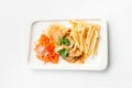 Roasted chicken fillet with carrot salad and french fries isolated on white background