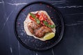 Roasted Chicken on Flatbread With Tomato Salad, Lime Wedge Royalty Free Stock Photo