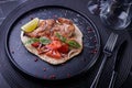 Roasted Chicken on Flatbread With Tomato Salad, Lime Wedge Royalty Free Stock Photo