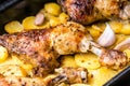 Roasted chicken leg with potatoes with caraway and garlic Royalty Free Stock Photo