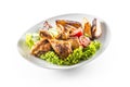 Roasted chicken legs with lettuce salad potatoes and tomatoes isolated on white
