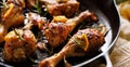 Roasted chicken legs with rosemary, garlic and lemon in a cast iron skillet Royalty Free Stock Photo