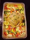 roasted chicken over vegetables