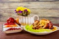 Roasted chicken. Thanksgiving table served with , decorated bright autumn leaves and candles. , Royalty Free Stock Photo