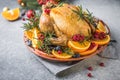 Roasted chicken or  turkey. Traditional festive food for Christmas or Thanksgiving. Christmas Dinner. Winter Holiday table setting Royalty Free Stock Photo