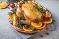 Roasted chicken or  turkey. Traditional festive food for Christmas or Thanksgiving. Christmas Dinner. Winter Holiday table setting Royalty Free Stock Photo