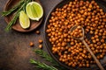 roasted chickpeas with smoked paprika served with lime and rosemary. Royalty Free Stock Photo