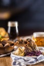 Roasted christmas duck leg red cabbage dumplings liver draft bee Royalty Free Stock Photo