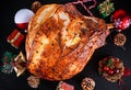 Roasted Christmas ham on board with festive decoration. top view, background Royalty Free Stock Photo