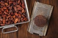 Roasted cocoabeans and 100% solid chocolate Royalty Free Stock Photo