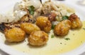 Roasted codfish with potatoes or Bacalhau a Bras